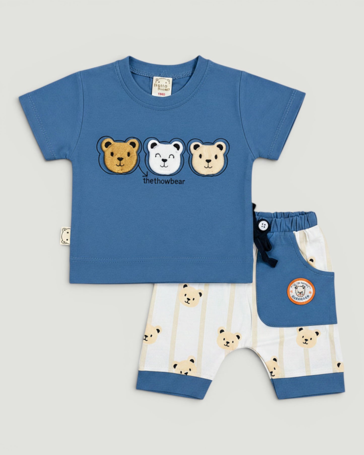 Little Roots baby boy blue cotton t-shirt with three embroidered bear faces and matching bear print shorts.