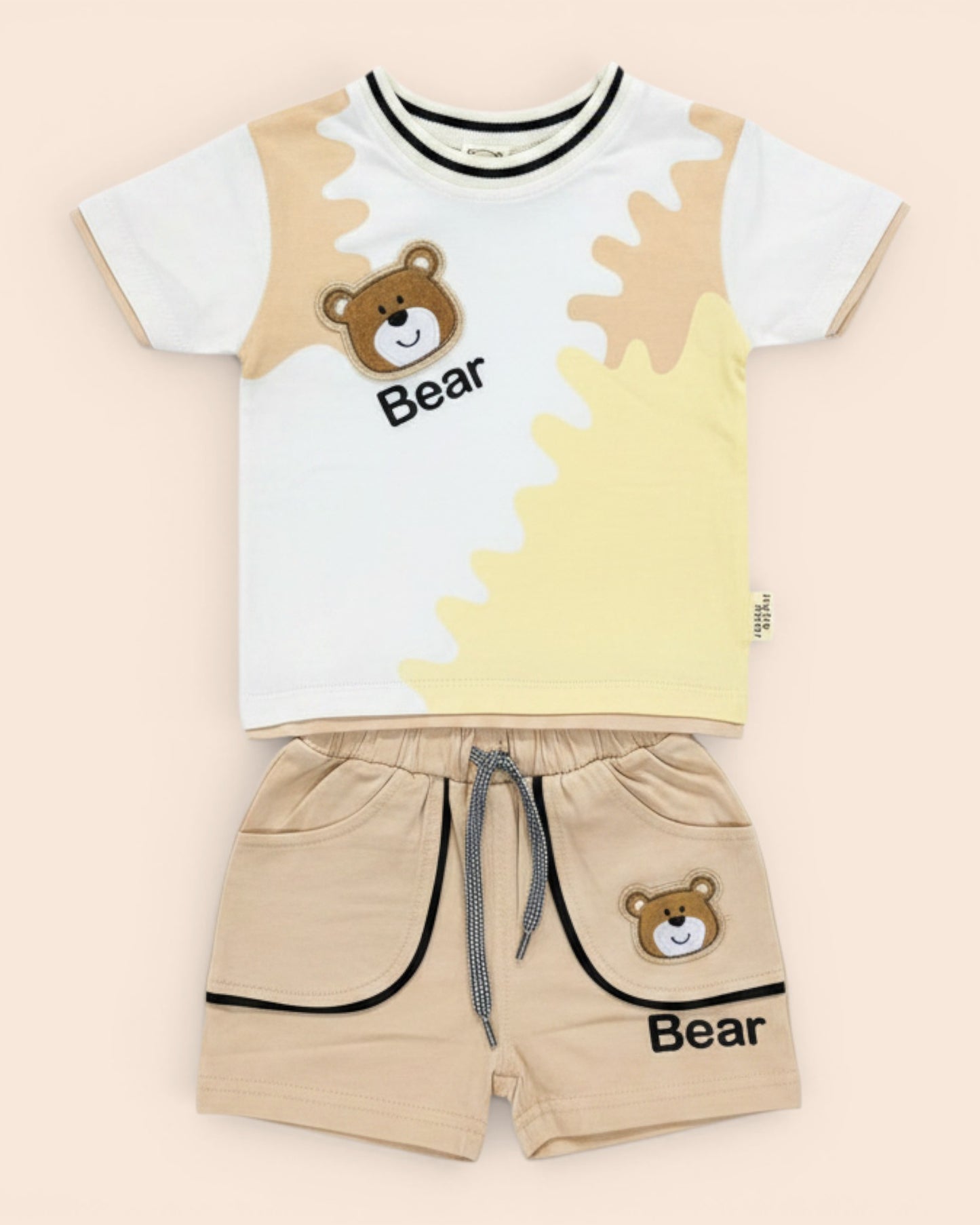 Little Roots Pakistan baby boy 2-piece outfit set with white & yellow t-shirt and beige shorts, featuring bear print and patch.