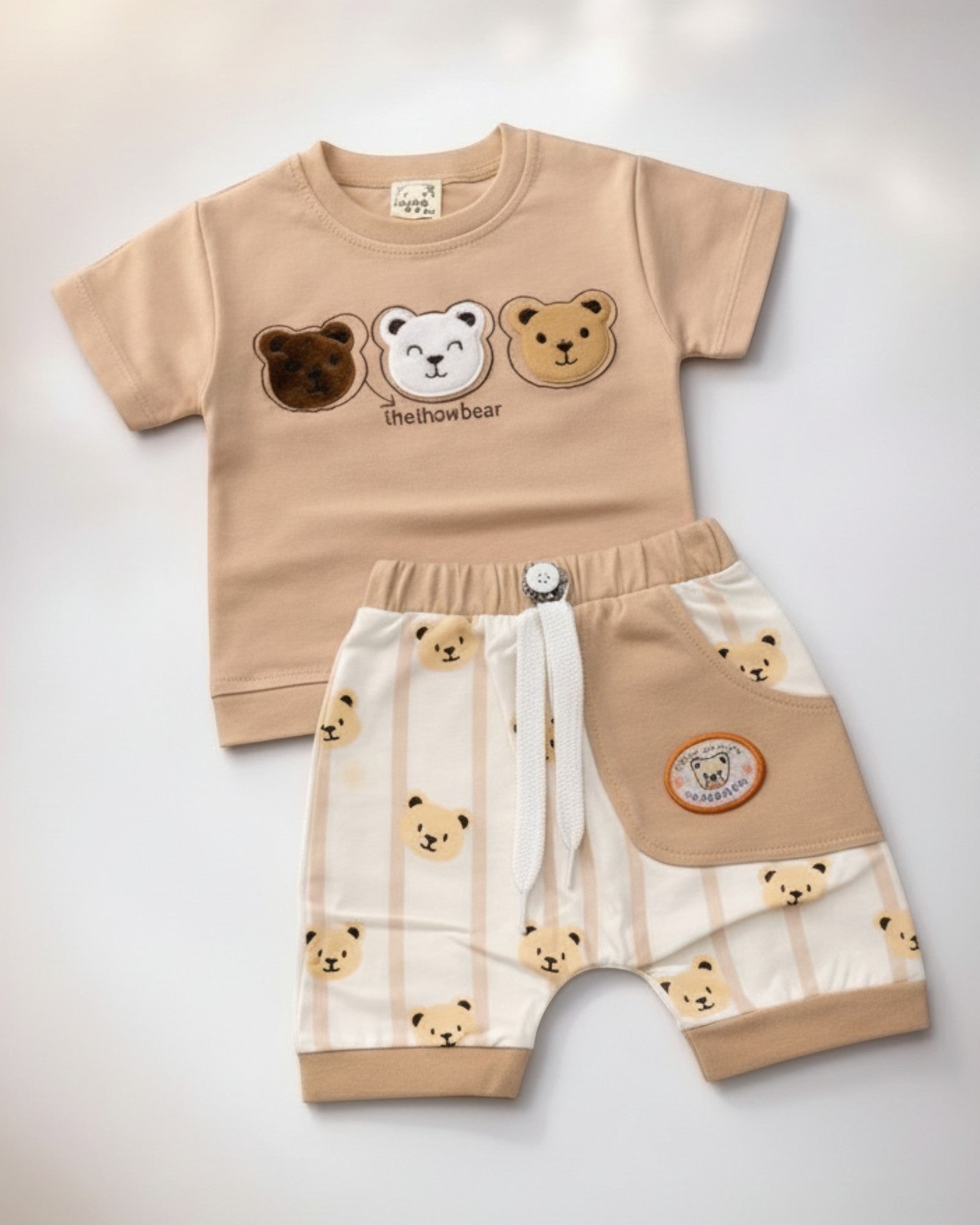 Little Roots baby boy beige cotton t-shirt with three bear embroidery and matching bear print shorts with drawstring.