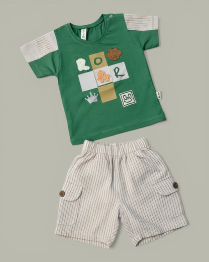 Little Roots baby boy green cotton t-shirt with "ROAR" graphic and beige cargo shorts. Summer outfit.