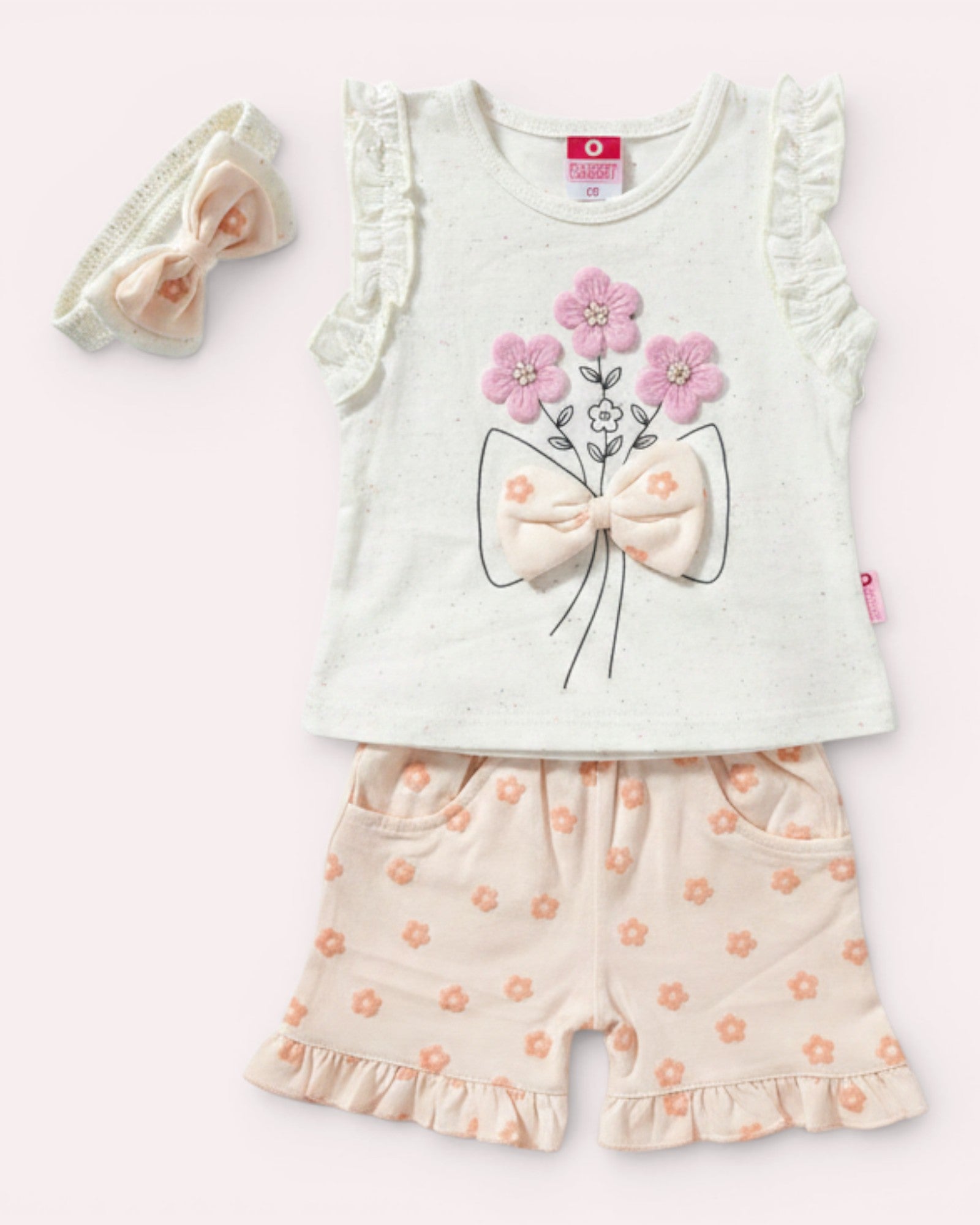 Little Roots baby girls' white floral embroidered top with ruffled sleeves, matching peach floral shorts, and headband. Perfect for summer.