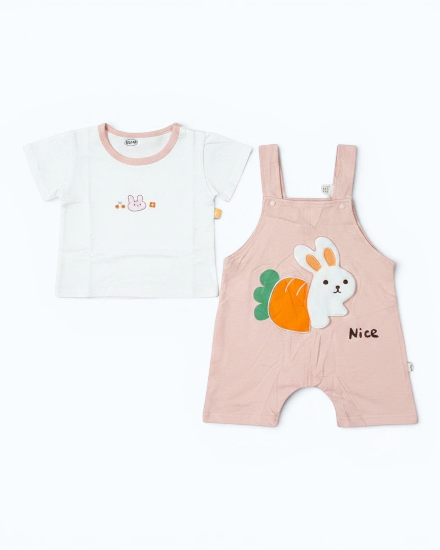Little Roots baby girl blush pink bunny romper with carrot print and white t-shirt. Soft summer outfit.
