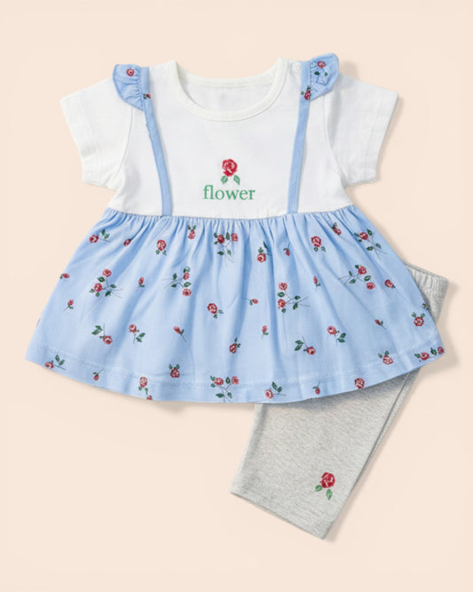 Little Roots baby girl's blue floral print cotton frock with white top and grey trousers. Features shoulder straps and flower embroidery.