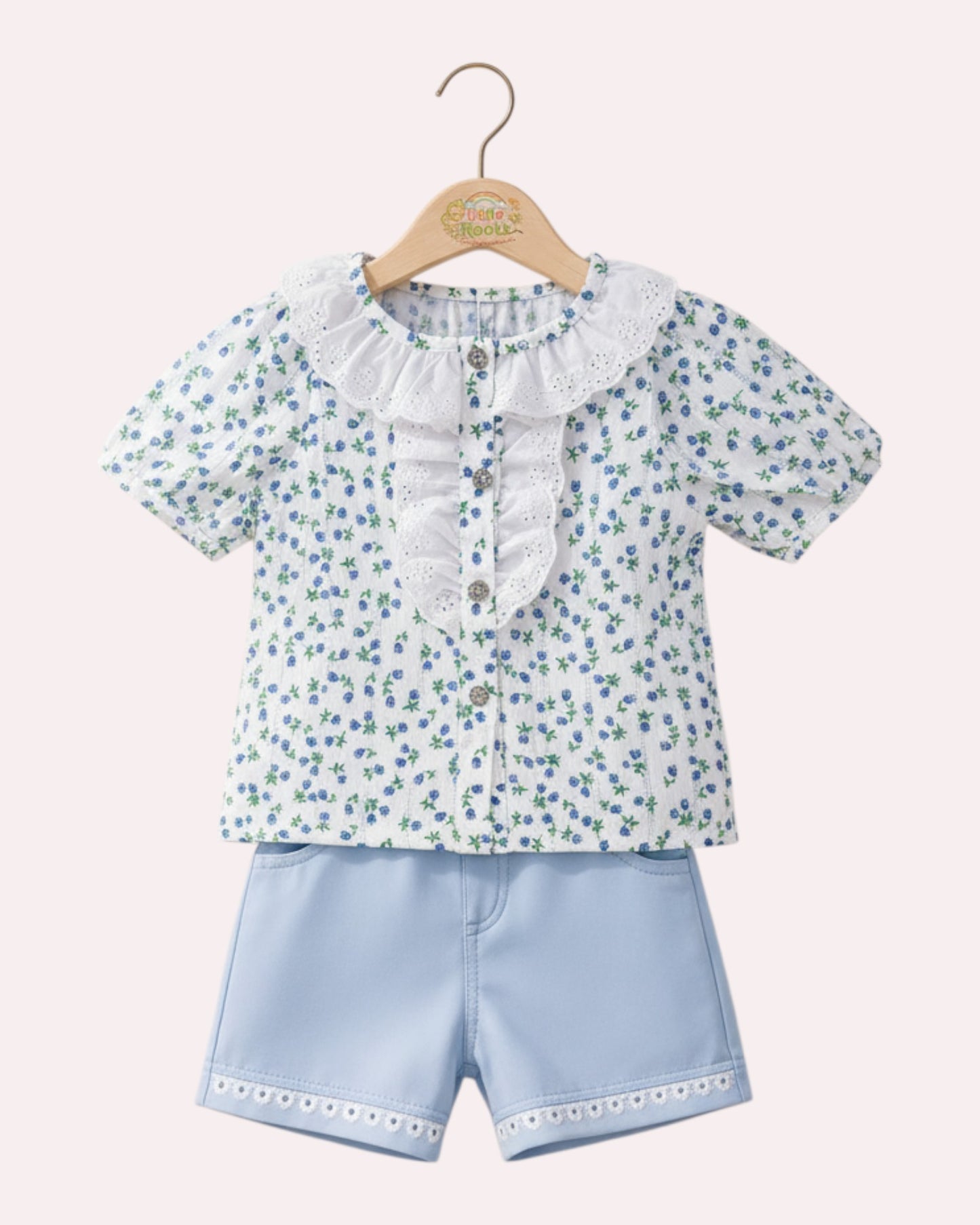 Little Roots baby girl blue floral print shirt with lace collar and matching light blue shorts, summer outfit.