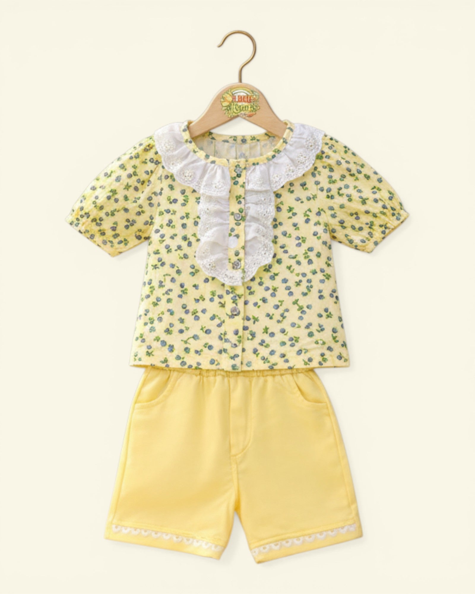 Little Roots baby girl yellow floral print shirt with lace collar and matching shorts, perfect for summer.
