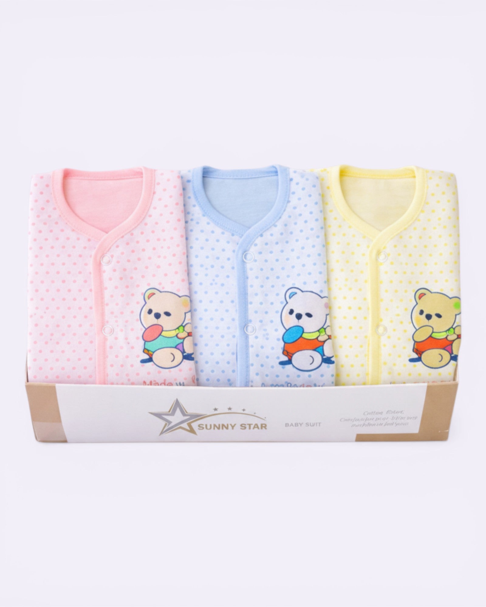 Little Roots pack of 3 newborn baby bodysuits in pink, blue, and yellow with teddy bear prints. Soft cotton, front button closure.