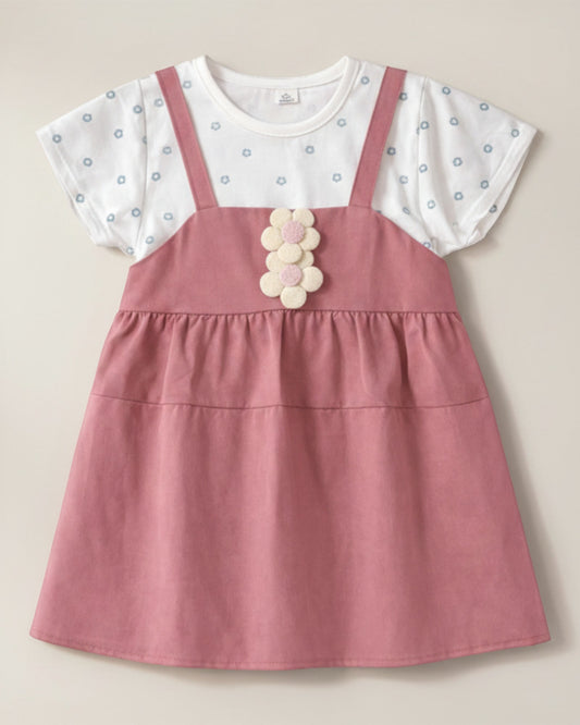 Little Roots baby girl's pink pinafore dress with attached white floral print top and 3D flower patch detail.