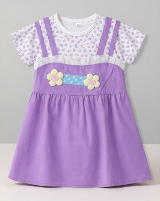 Little Roots baby girl's purple attached frock with floral print top, 3D flower belt, and pleated neckline. Lightweight summer dress.