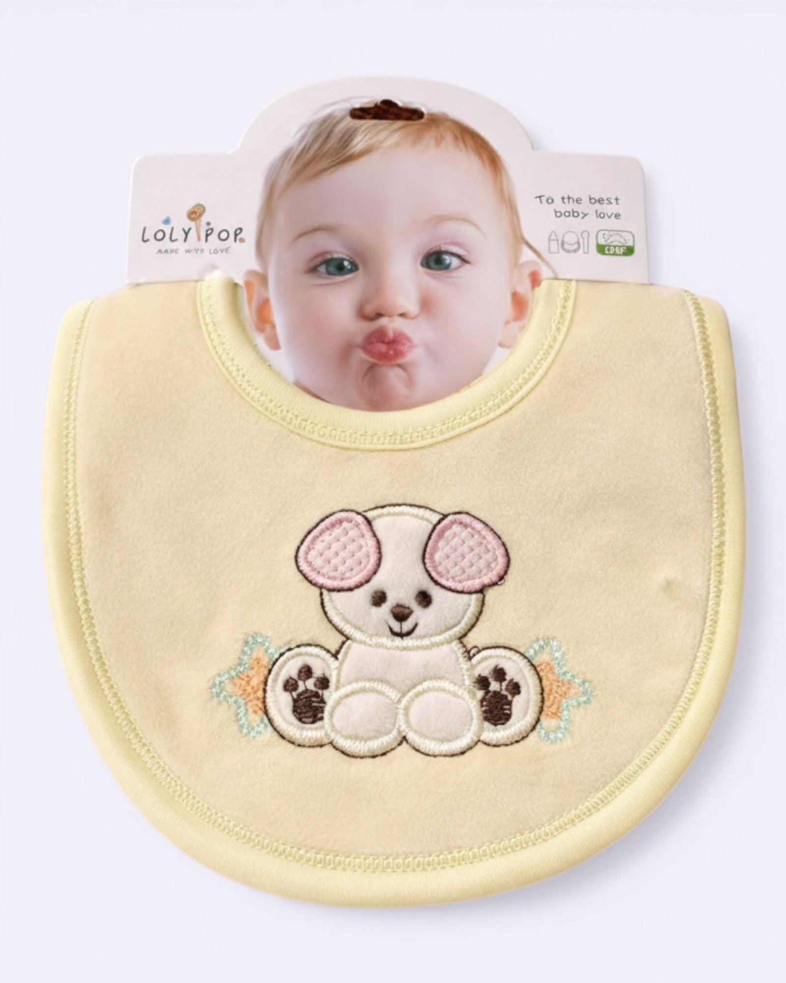 Little Roots pale yellow cotton baby bib with embroidered bear and star detail. Soft, absorbent, and easy to wear.